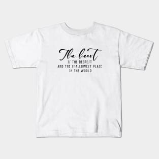 The heart is the deepest and the shallowest place in the word ( black writting) Kids T-Shirt